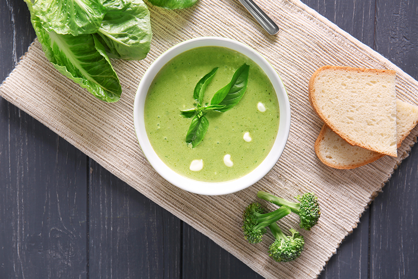 Bowl with fresh kale soup 